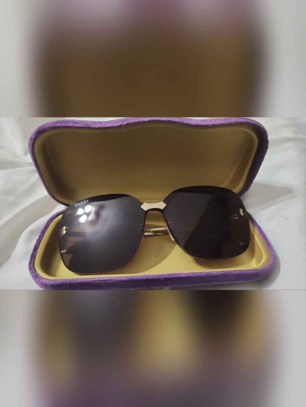 Gucci Black Lens Sunglasses with Gold Bridge
